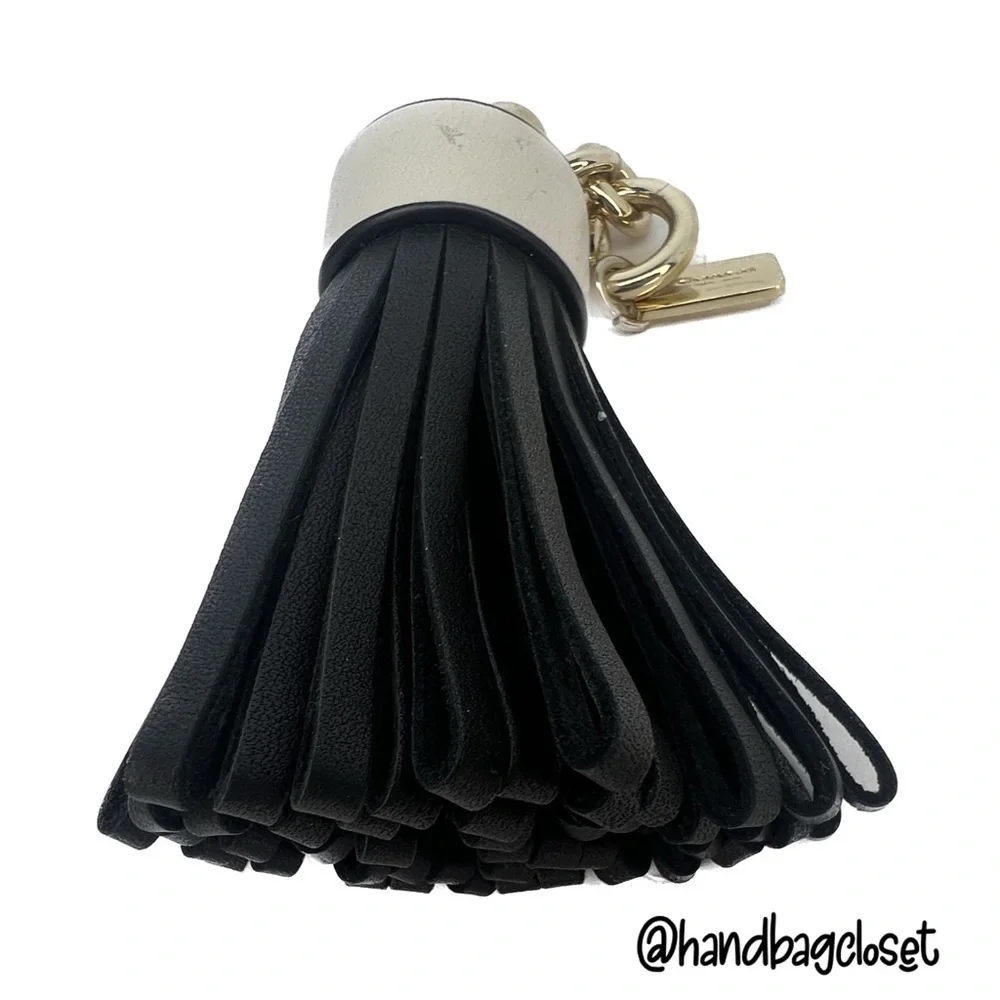 COACH LEATHER TASSEL BAG CHARM (F58505)
GOLD/BLACK KEY CHAIN KEYCHAIN - Picture 9 of 12